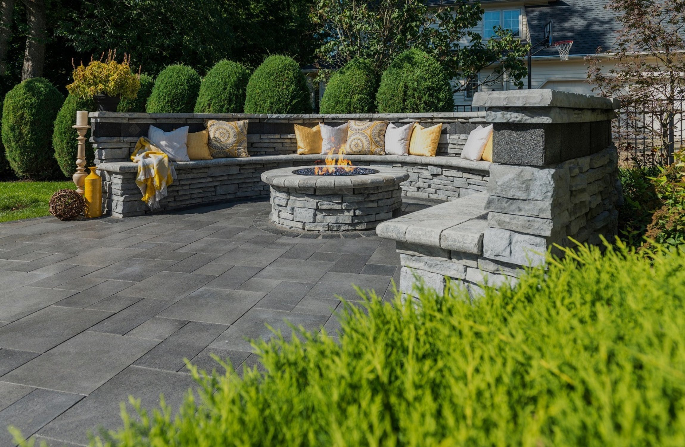 paver patio with seating wall and fire pit