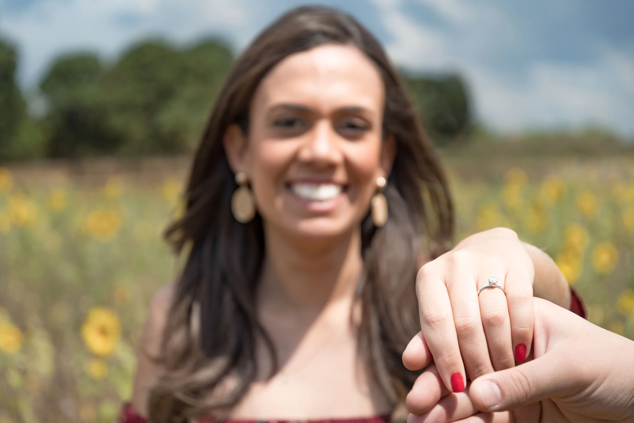An engagement portrait session showcasing a couple and ring at Fingal Heads on the Tweed Coast, captured by Scott Hardy Photography
