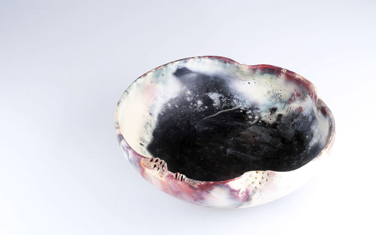 Raku fired altered vessel - sold