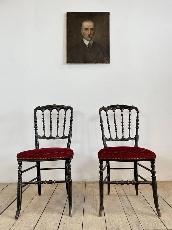 Pair Of Antique French Ebonised Napoleon Chairs