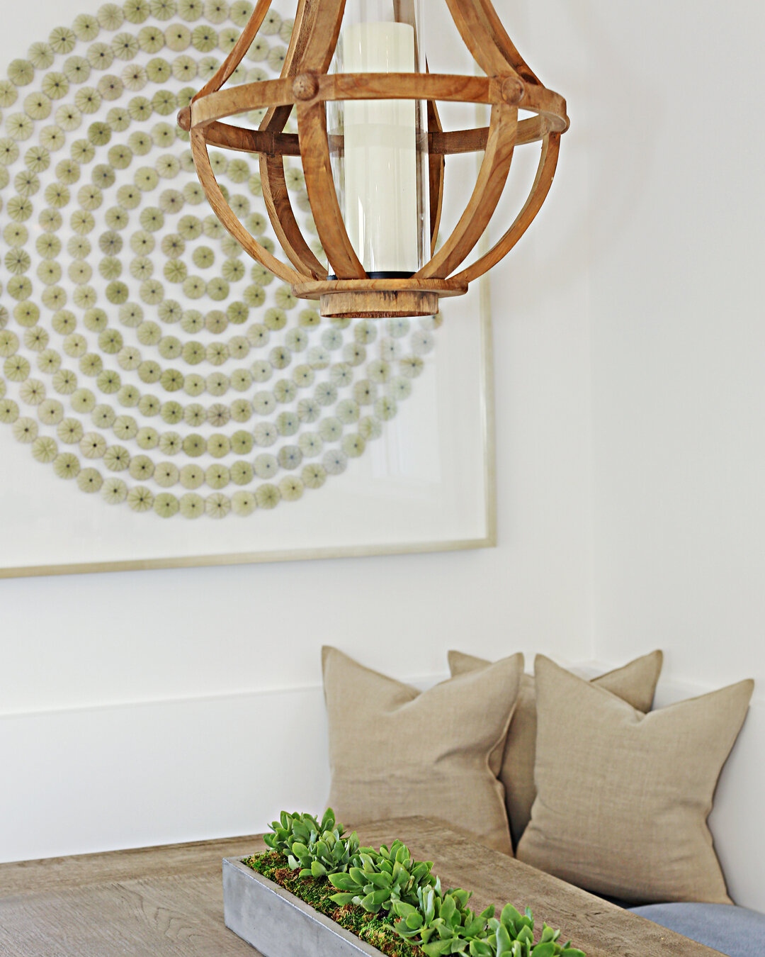 A perfect banquette highlighting some special art and comfy cozy libeco linen shams.