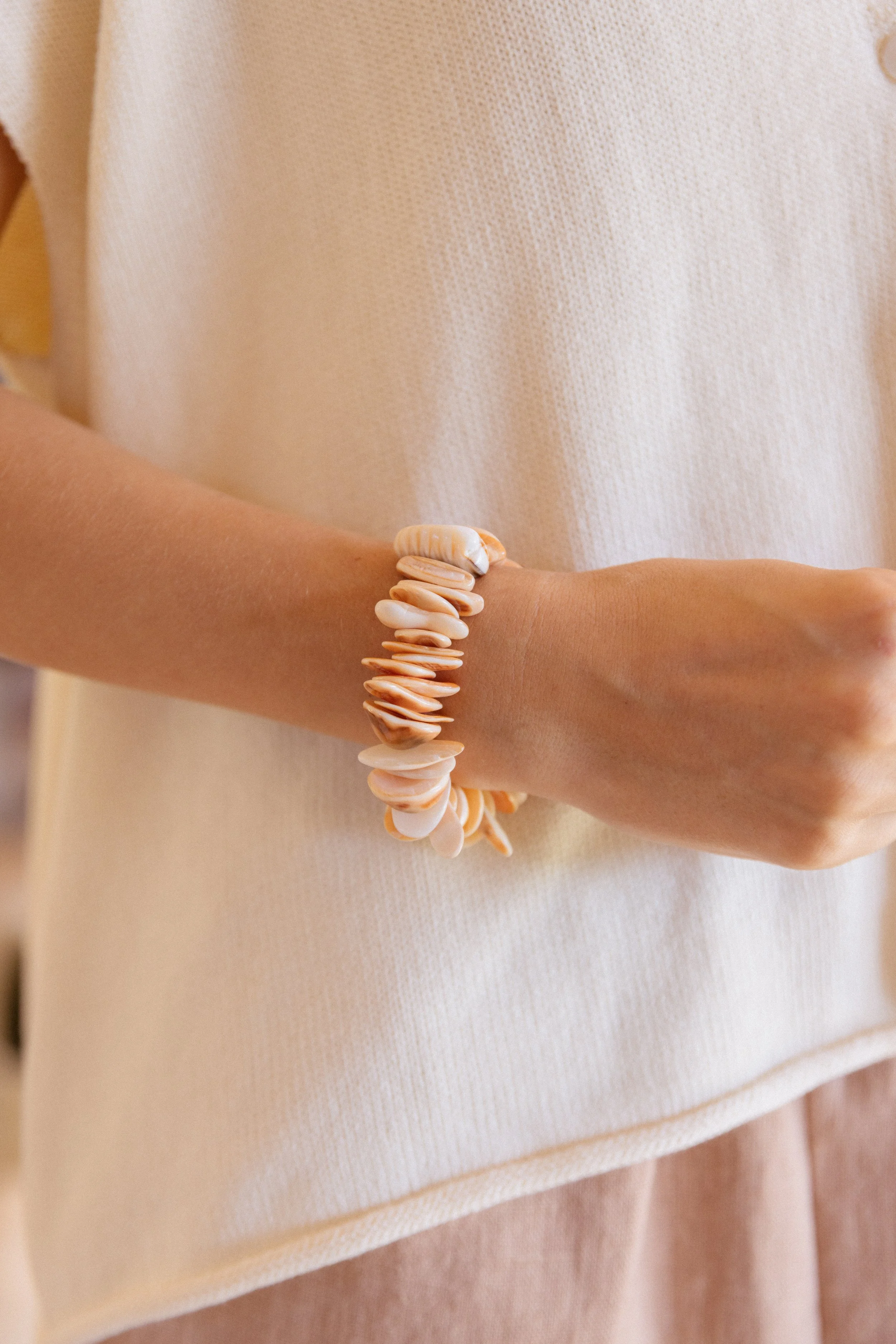 sun-and-her-peach-shell-bracelet-closeup.jpg