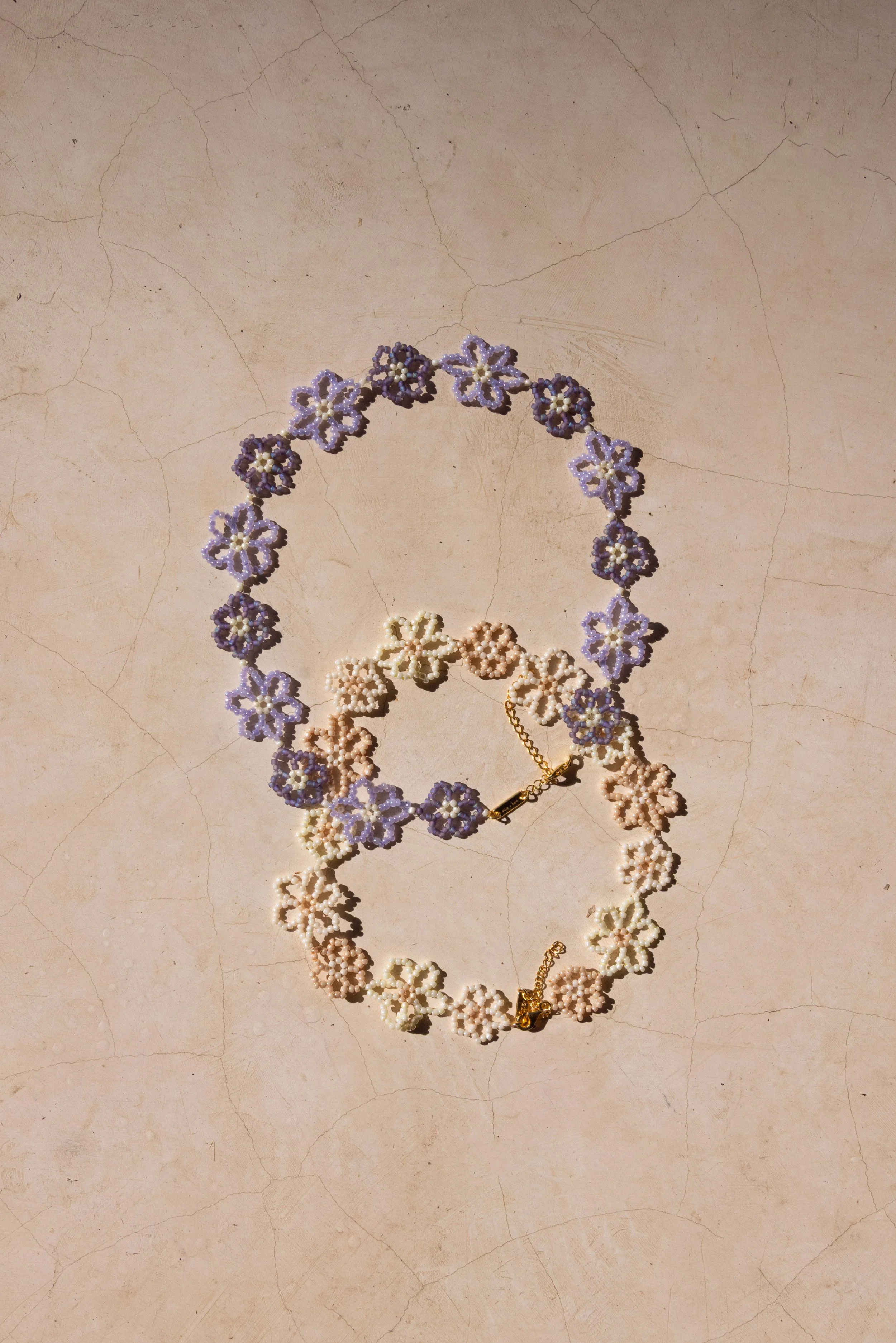 sun-and-her-beaded-bali-flower-necklace.jpg