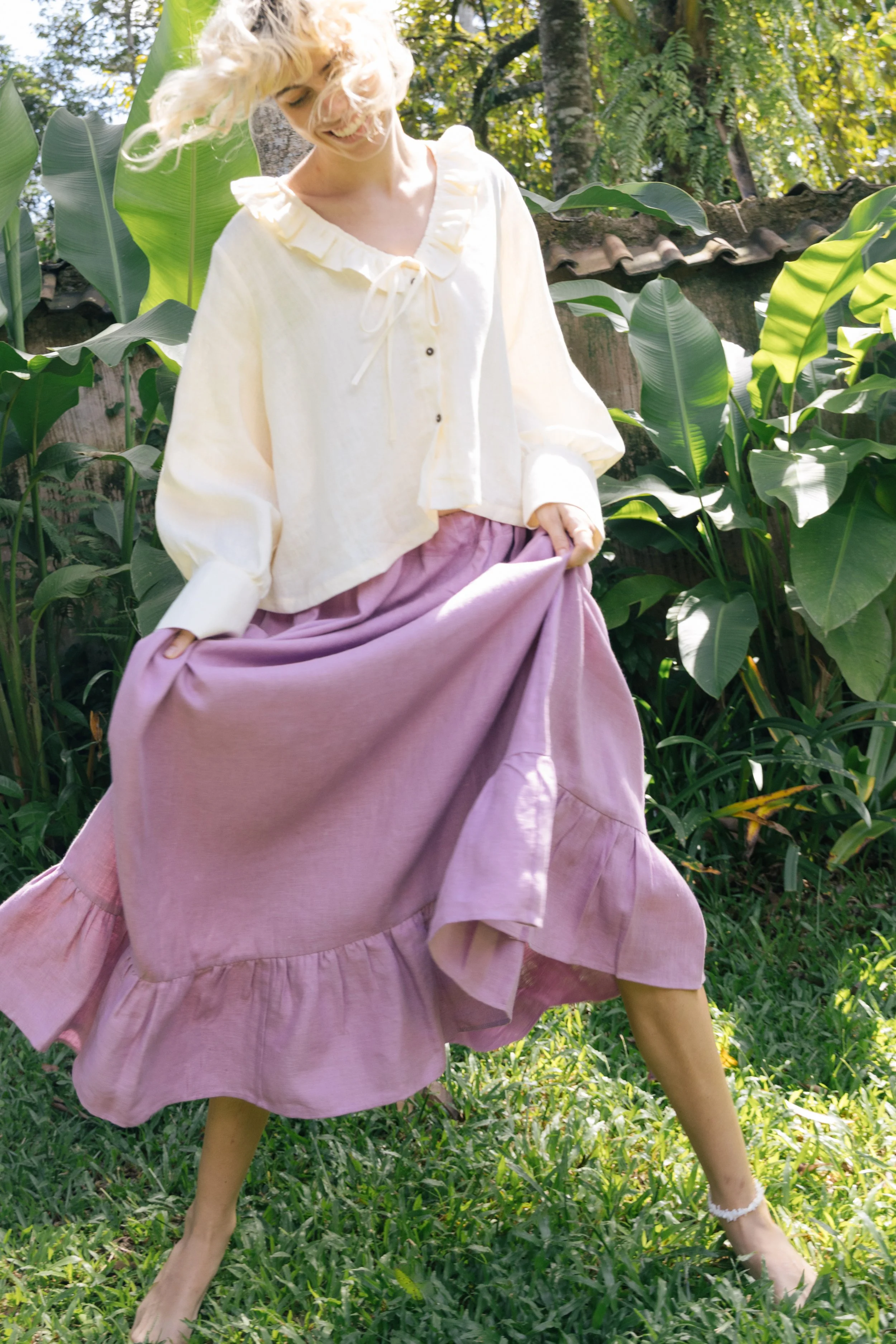 sun-and-her-ruffle-hem-linen-skirt-rosewood-pink-jumping.jpg