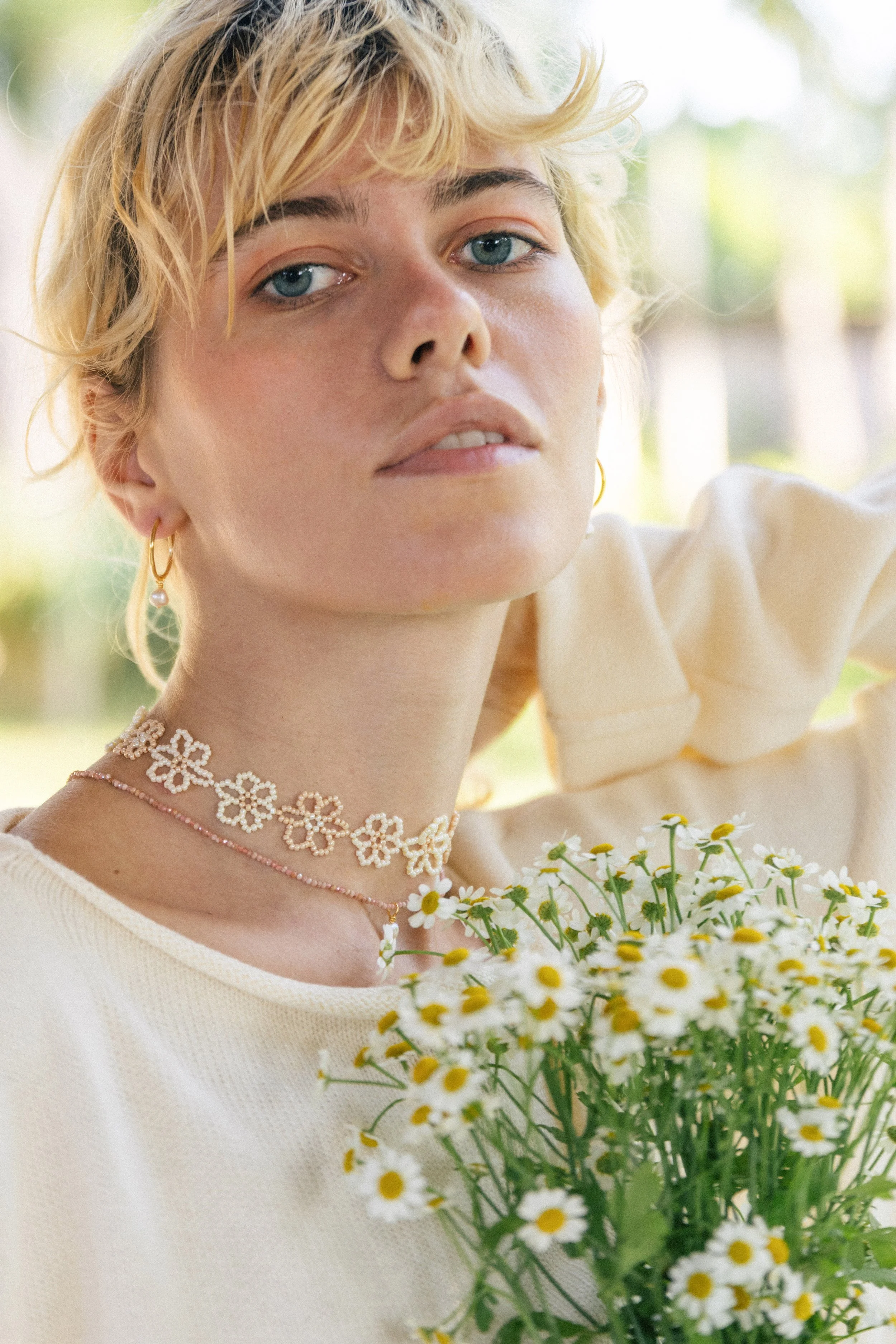 sun-and-her-beaded-bali-flower-necklace-nude-apricot-3.jpg