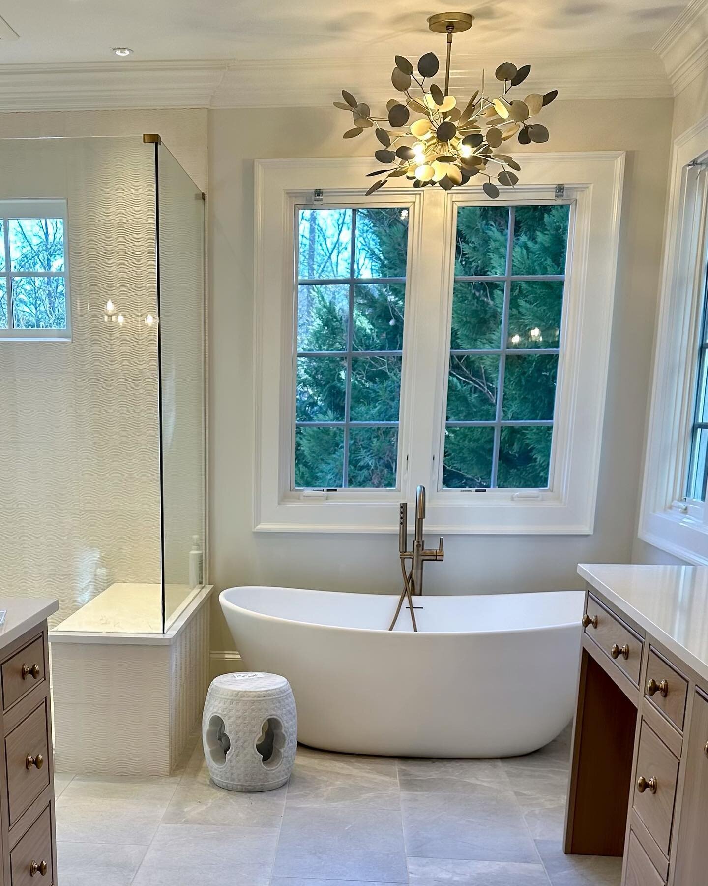 We love starting a design project during construction so we can select materials that make a space unique and special. 

There is so much to choose from to make each space unique and special by mixing materials. In this bathroom renovation, we used a