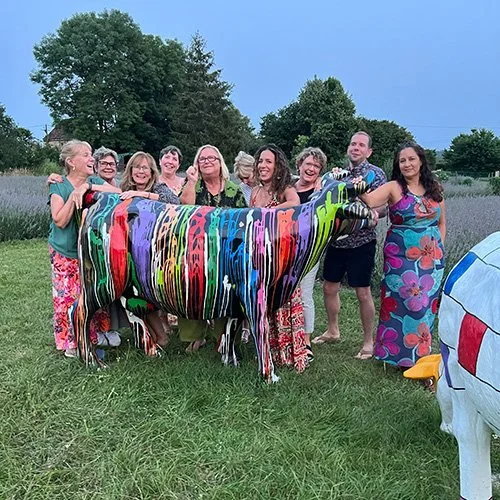 everyone by the cow.jpg
