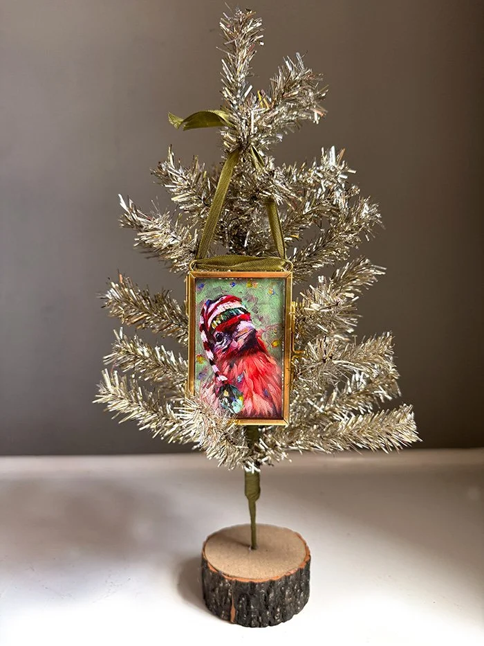 finch in hat on tree_cropped.jpg