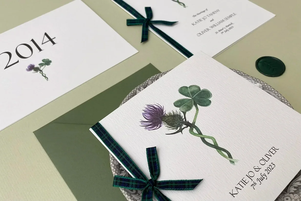 Entwined thistle and rose