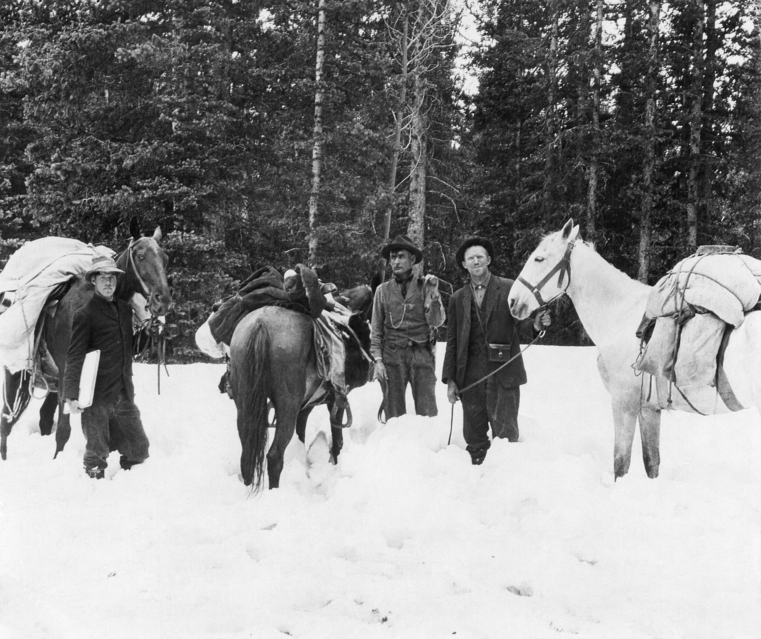  William Kelso (middle) leads a boundary survey to denote the divide between South Platte District and Clear Creek District in 1909. Kelso was the first District Ranger for Clear Creek District serving from 1906-1932 - back in the day when the Ranger