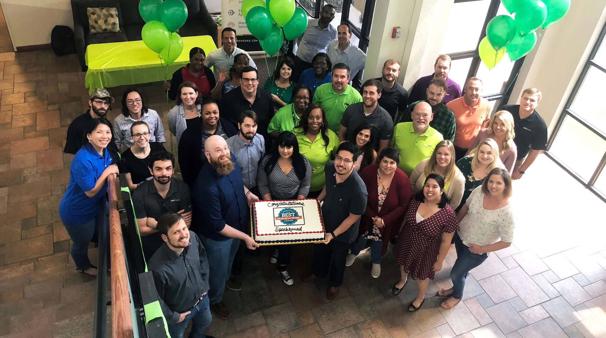 A group of Sparkies in the Baton Rouge office celebrate being awarded 2019 Best Places to Work