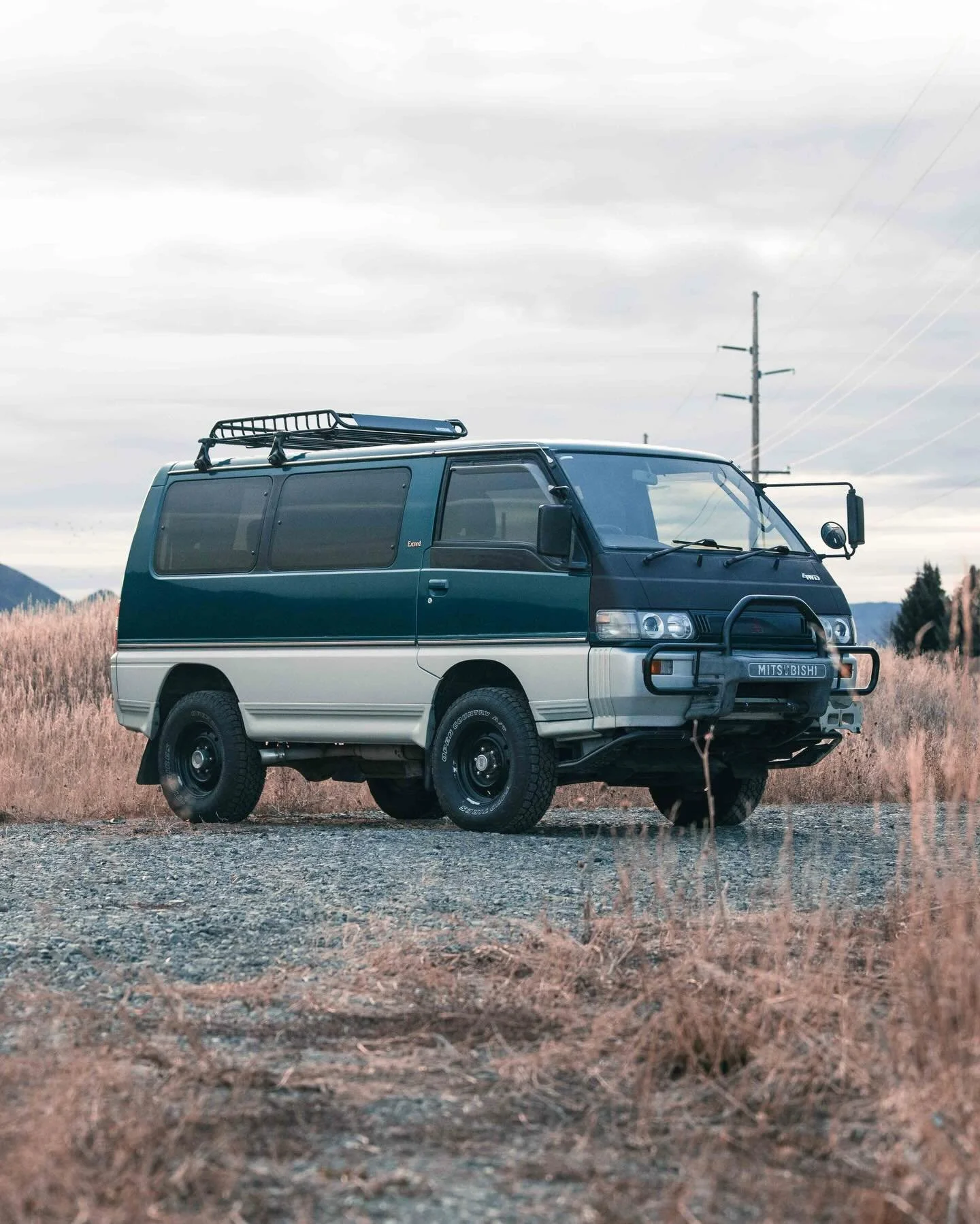 🚨BLACK FRIDAY SPECIAL🚨

Meet Sly &mdash; a 1993 Mitsubishi Delica L300 Star Wagon Exceed with character, grit, and just the right amount of turbo whistle. Factory two-tone green/grey paint, rugged steel wheels wrapped in 29&rdquo; Toyo A/Ts, and a 