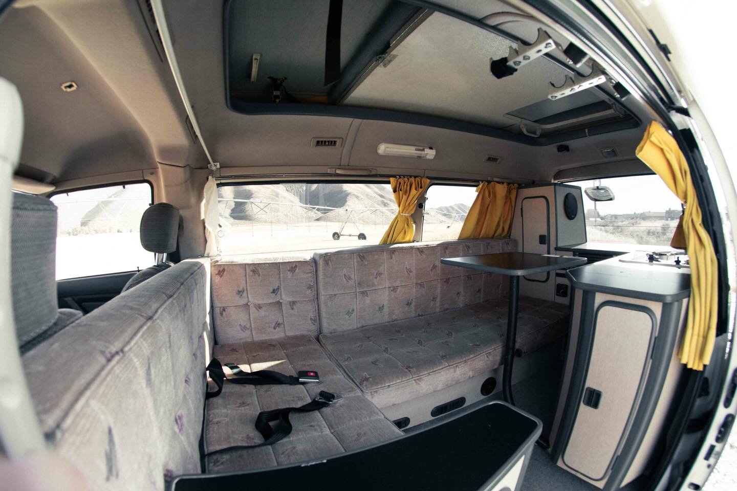 L shaped couch in your van?! Moa&rsquo;s interior looks like it was teleported from 1996 to 2025. This pop-top Delica has every amenity you could need, plus room to stand up!

-Running Water
-Fridge
-Propane Stove
-Diesel Parking Heater
-Seating &amp