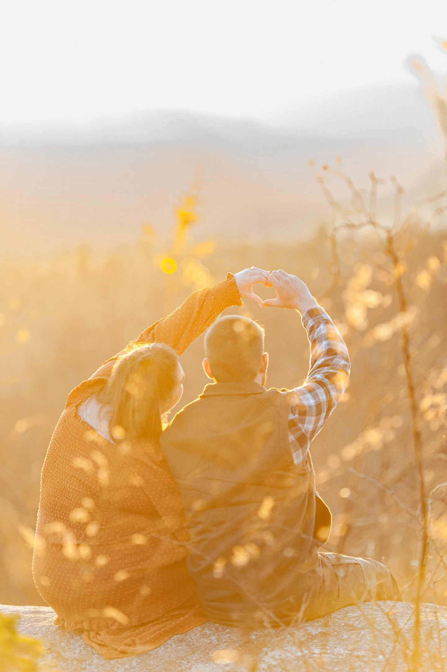 Last weekend my family took a little adventure up to Sassafras Mountain so that I could photograph Ashley and Justin's engagement session.  While it was warm-ish at the bottom of the mountain, we were absolutely frozen at the top while we waited for 