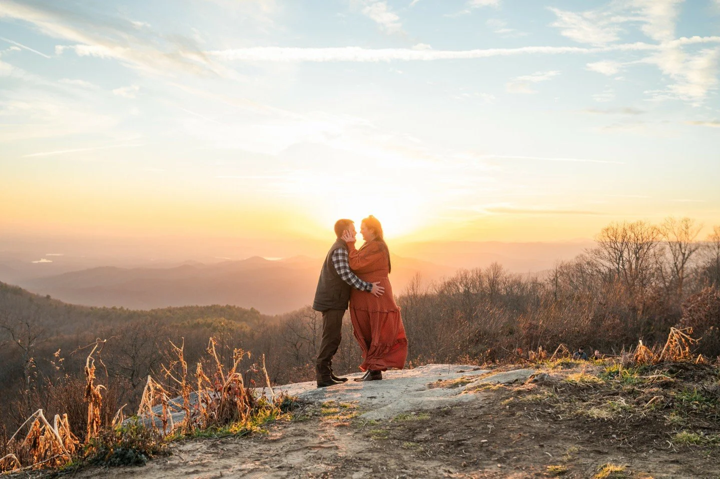 In exactly one year, these two will say their I do's...
About 6 months ago I rode up to Sassafras mountain to meet Ashley and Justin for their romantic mountaintop engagement session.  Although it was a warm-ish December day, it was SO COLD at the to