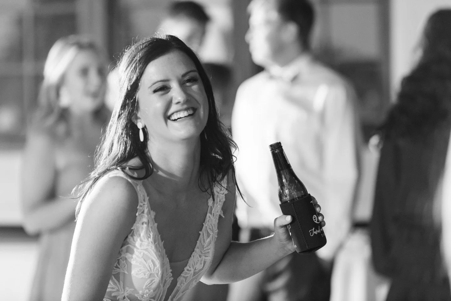 Sometimes my favorite photos aren't the perfectly composed ones with sharp focus...they're the ones that show true joy and emotion, like this one of Sarah at her reception.  This was in the Summer of 2021, which for many, was their first big event po