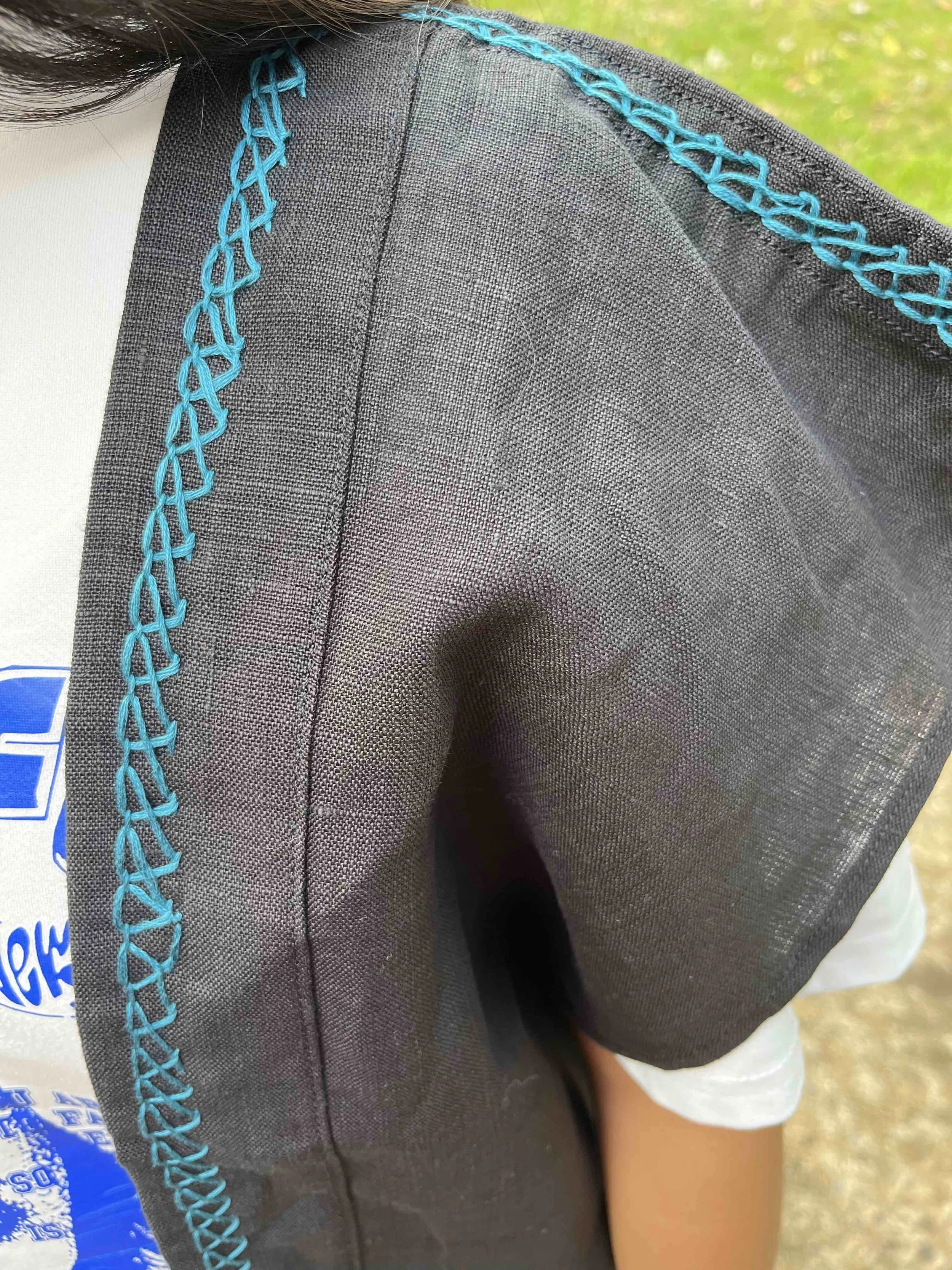 open-huipil-black-blueembroidery-closeup.jpg