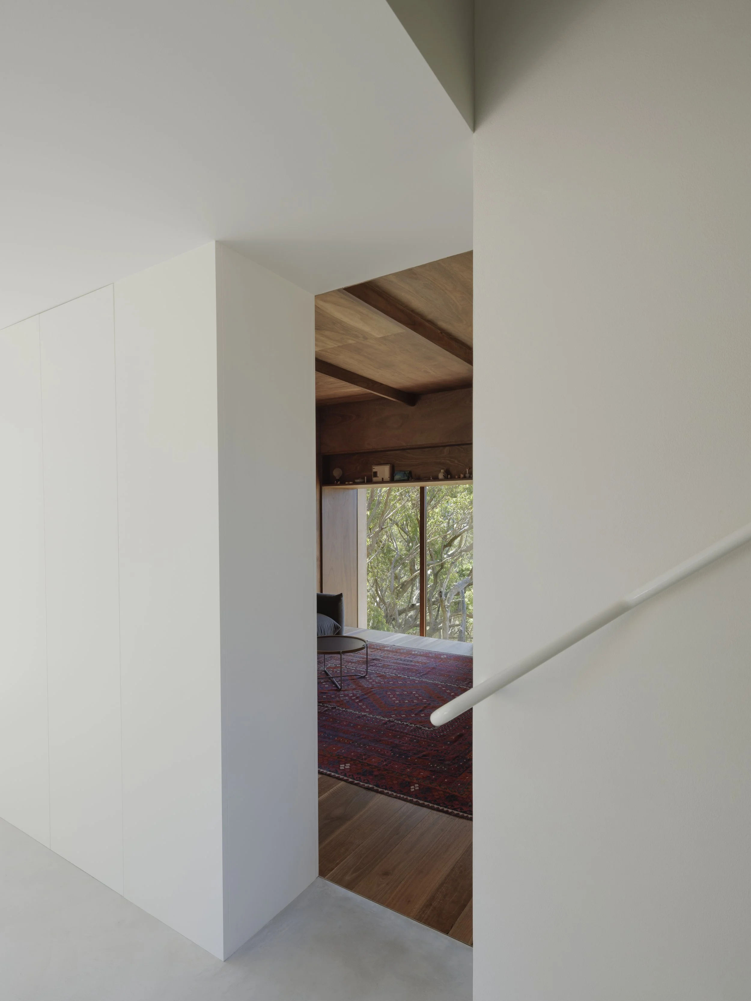 Interior Architecture of EA house. Transitional space double height and contrasting materials