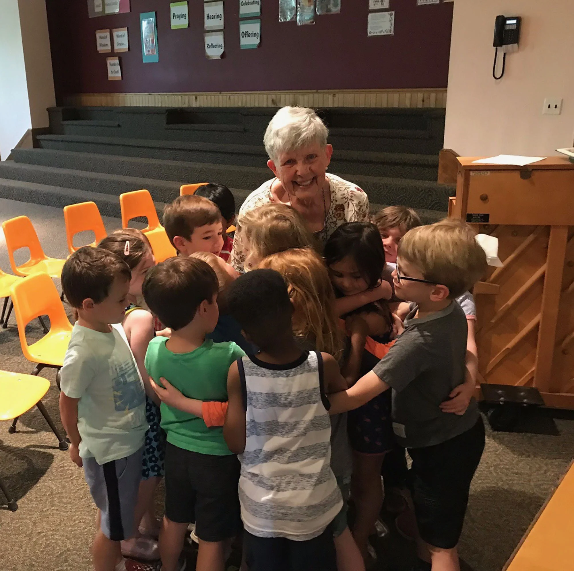 Joyce Perry and students in the music room of Swarthmore Presbyterian Nursery Day School, May 2019.
