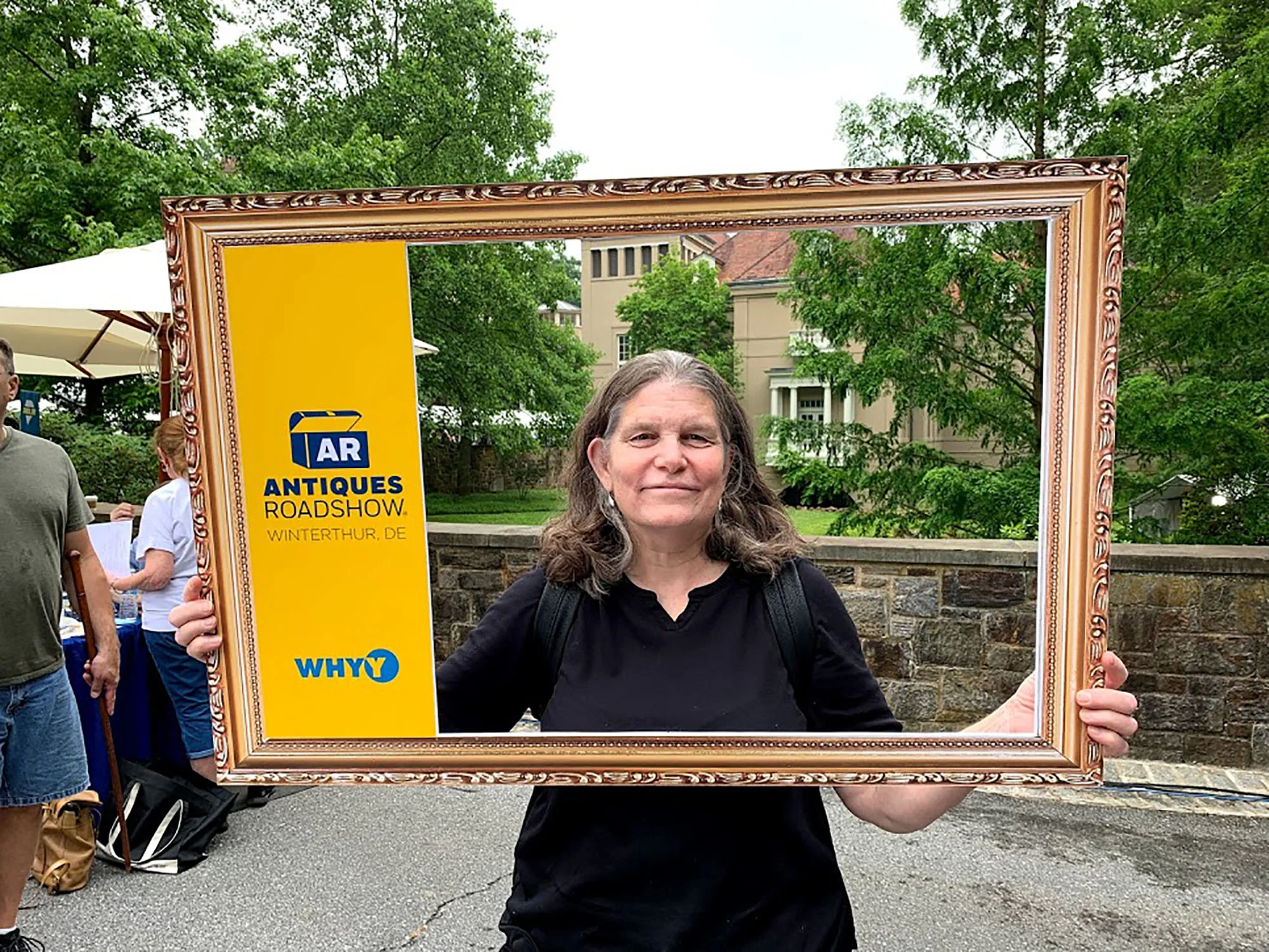 Elizabeth Vogdes with her Antiques Roadshow souvenir. She pointed out that “Clearly SOMEONE was allowed to take photos — see ‘ Behind the Scenes of Season 24 ’ on the Antiques Roadshow Website. www.pub.org/wgvh/roadshow/season/24/winterthur-de