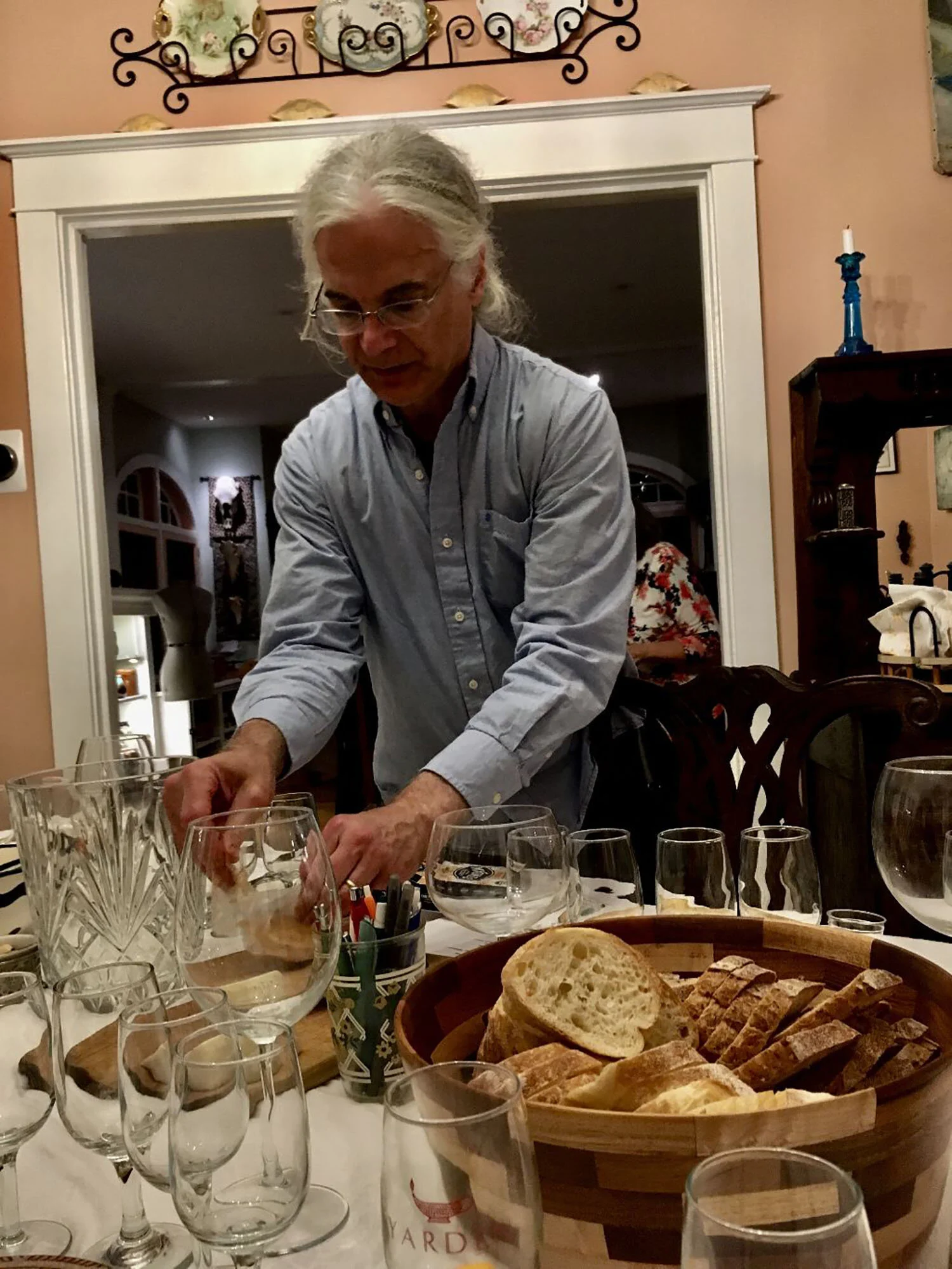 Steve Platt set out dozens of glasses for a recent Ethanology tasting. Photo by Karen Vesely.