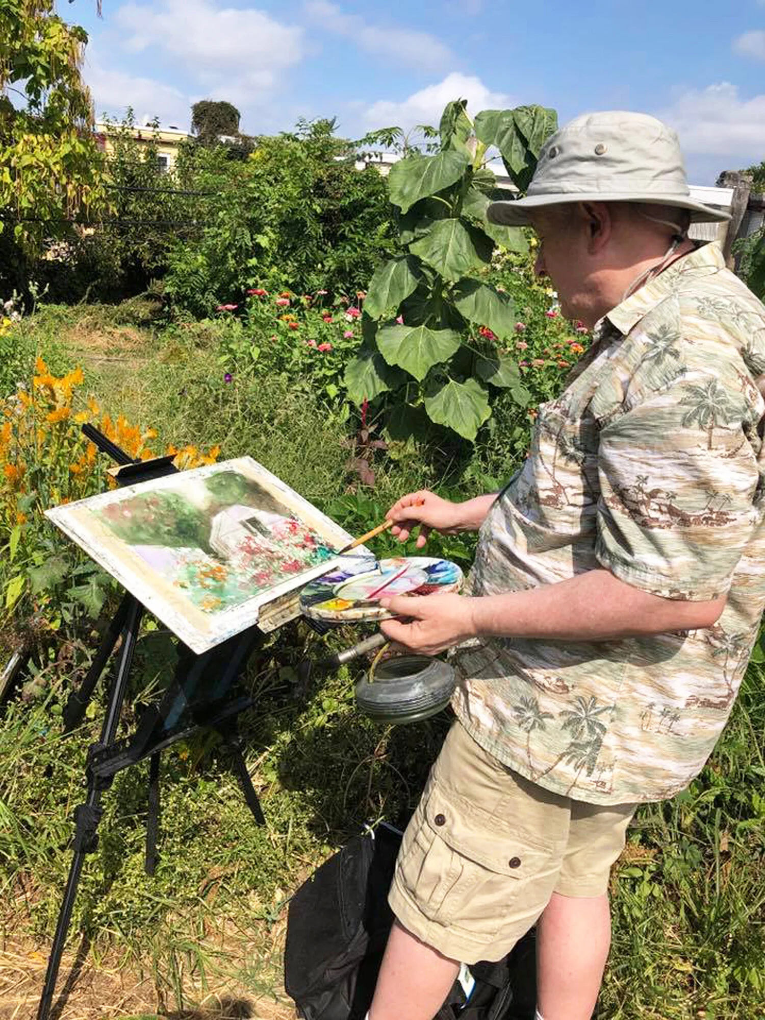 The Harvest Gathering celebrates music, food, beer, and art, including paintings by 25 local artists including Ray Nixon.