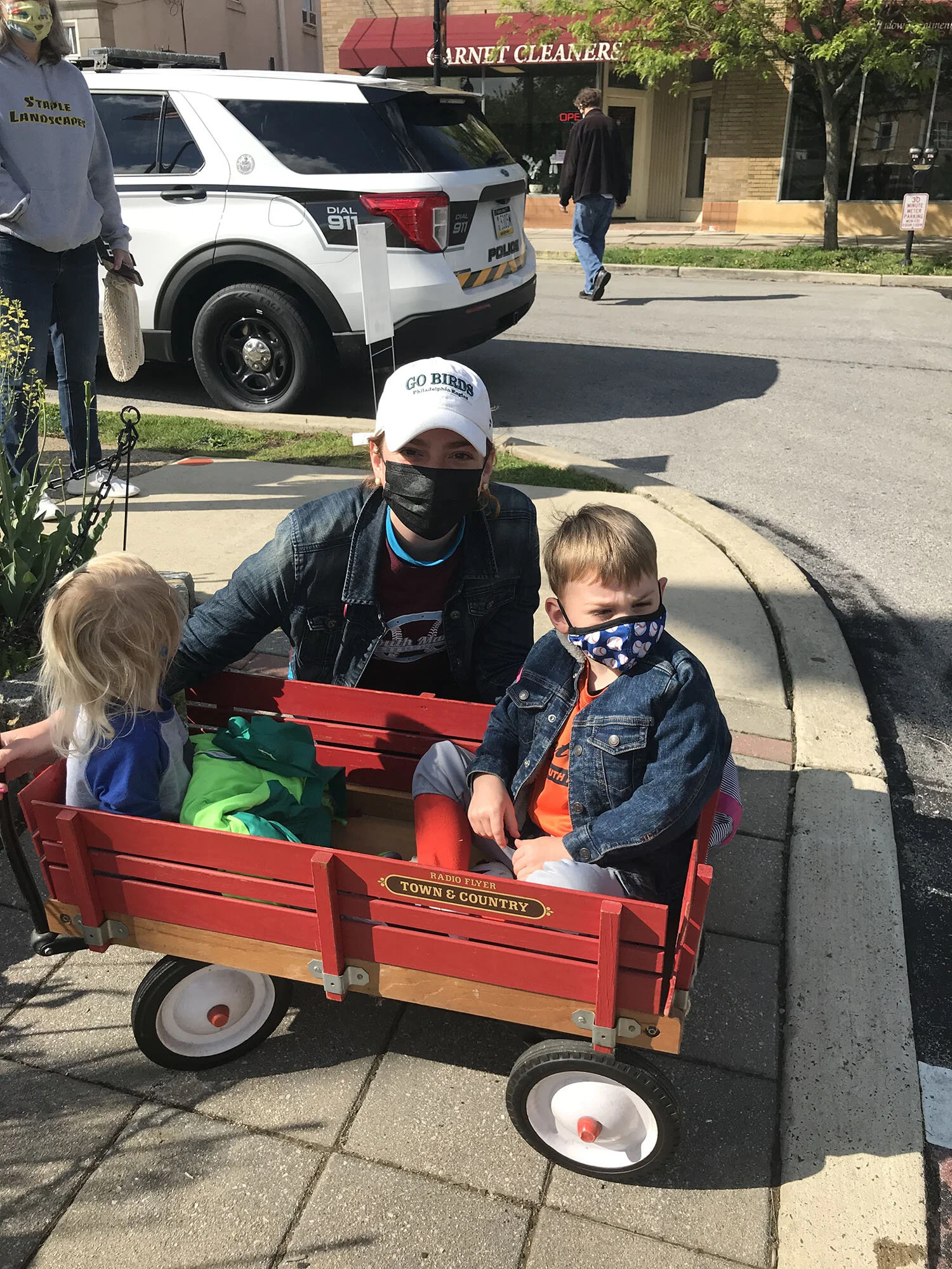  “We come every week together. Today we’re picking up plants to put in our garden. (But the squirrels might eat all our food.)”  Erin Kennedy-Rogers with Connor and Jack  