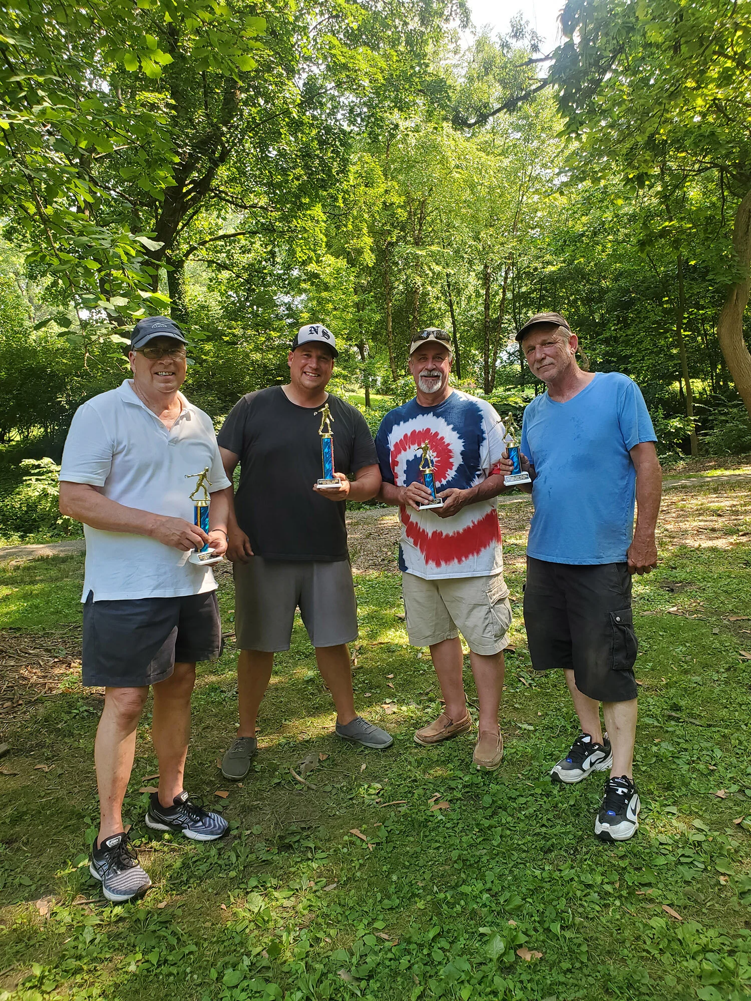  Independence Day Celebration in Swarthmore. Twenty teams participated in the Cris Hansen Memorial Town Horseshoe Tournament on July 5. The photo features (left to right) the winners, Don Grimes, Sr., and Don Grimes, Jr., and the runners up, Larry Sc