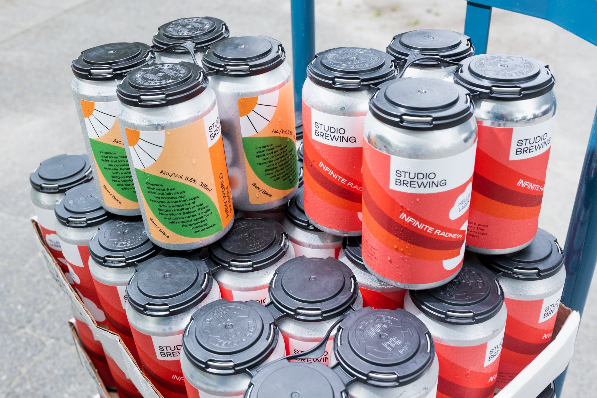 Stack of cans from Studio Brewing