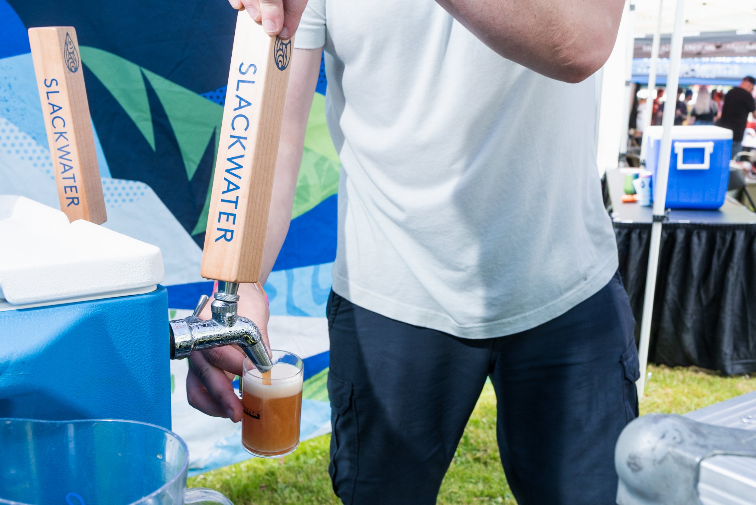 Beer pouring at Slackwater Brewing booth
