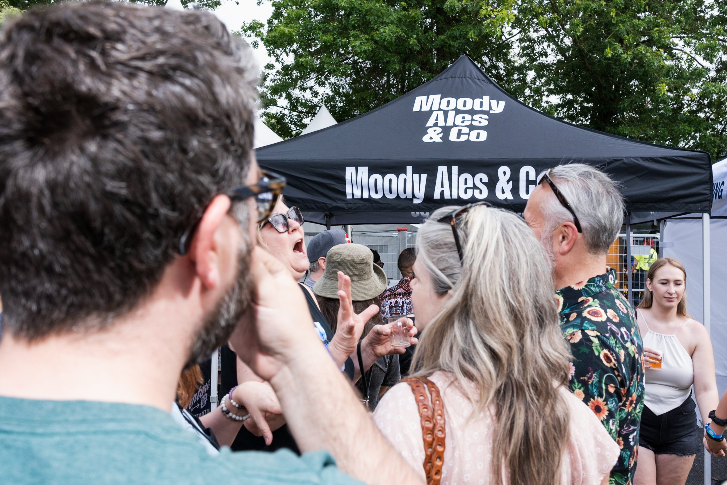 Moody Ales booth with lineup outside