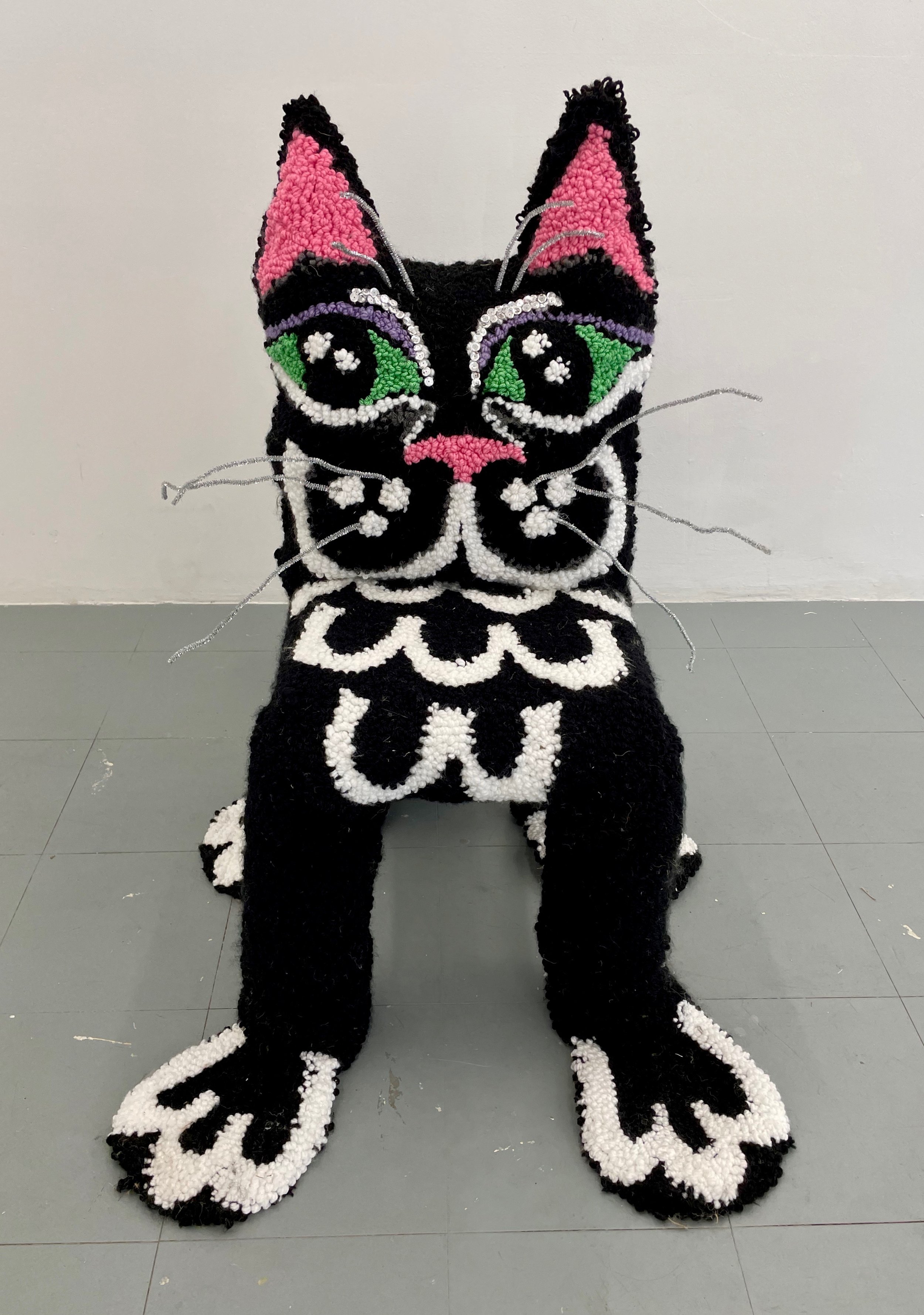  Wilburs whiskers, 2022 105x90x65cm, wool, pipe cleaners, hessian on plastic and metal chair