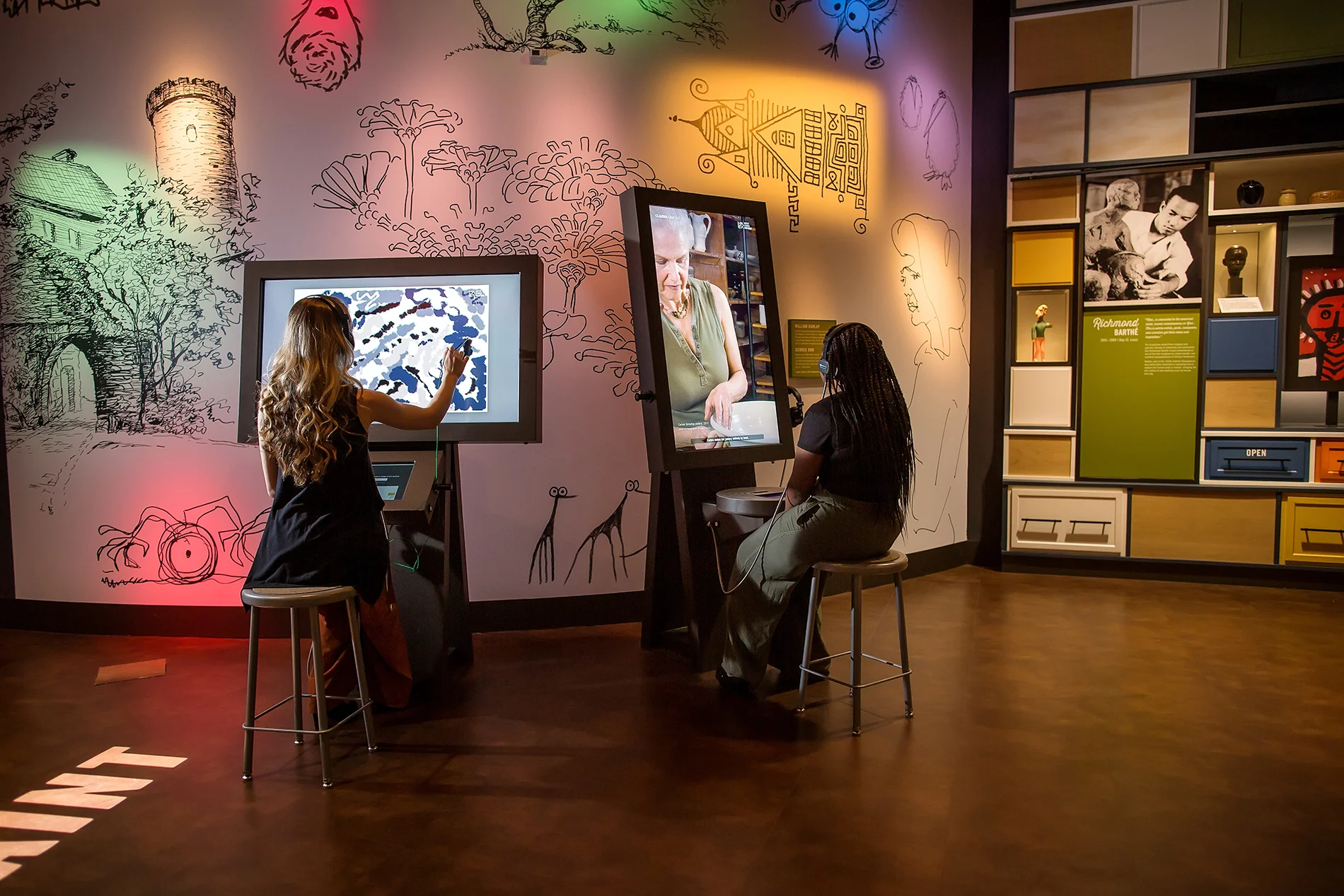 Artist Studio: This installation showcases the Mississippian artists and their techniques to create their sculptures or paintings. The installation resembles an artist easel made of a 44-inch screen located at the top of the easel and a tablet located at the bottom.