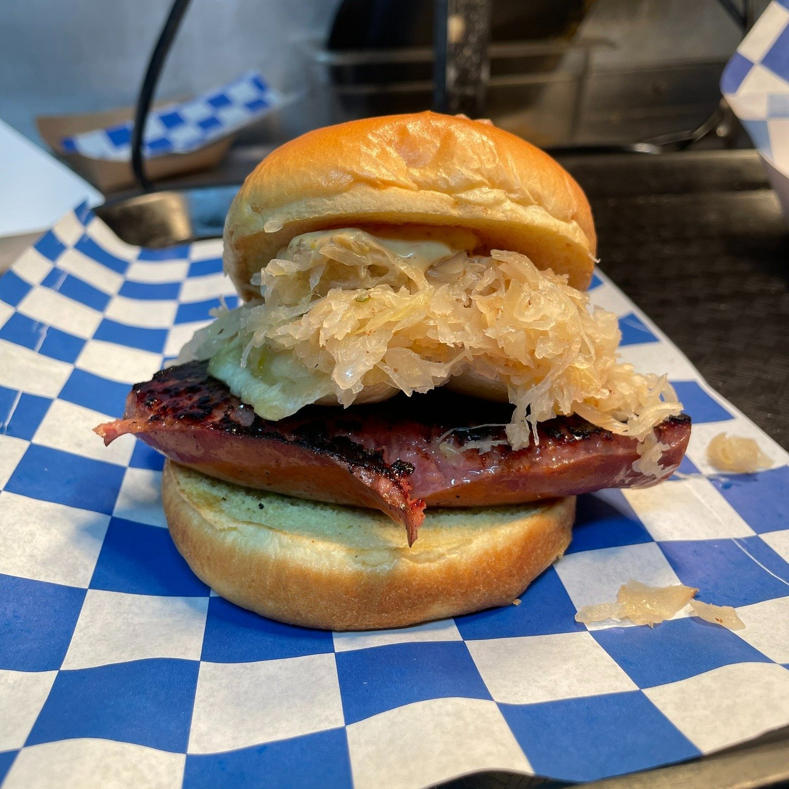 The Polish Hill Sandwich: kielbasa, 2 pierogies, sauerkraut, and pub mustard piled high on a bun! @twofortheroad bringing the steel city vibes this weekend! Enjoy one when picking up your 2024 Capital Craft Beverage Passport.  #polishhill #pittsburgh