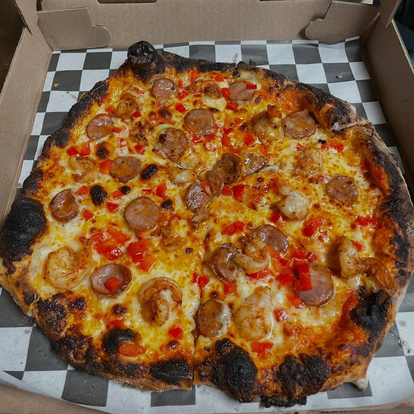 Damn, Lukas went wild with this one. Mardi Gras special tonight from @cruetpizzatruck: sausage, shrimp, red peppers, red sauce, and mozz. Trivia with @natchristiana starts at 6pm! #thursday #pizza #mardigras #trivia