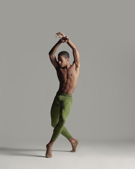 green pants hands up.jpeg