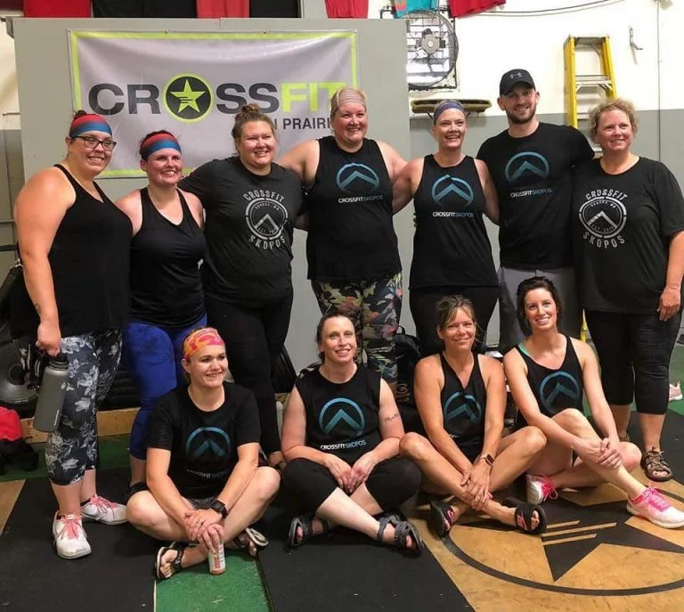 Jasmine (center back row) hanging out with a host of CrossFit Skopos folks at a recent competition in their area.