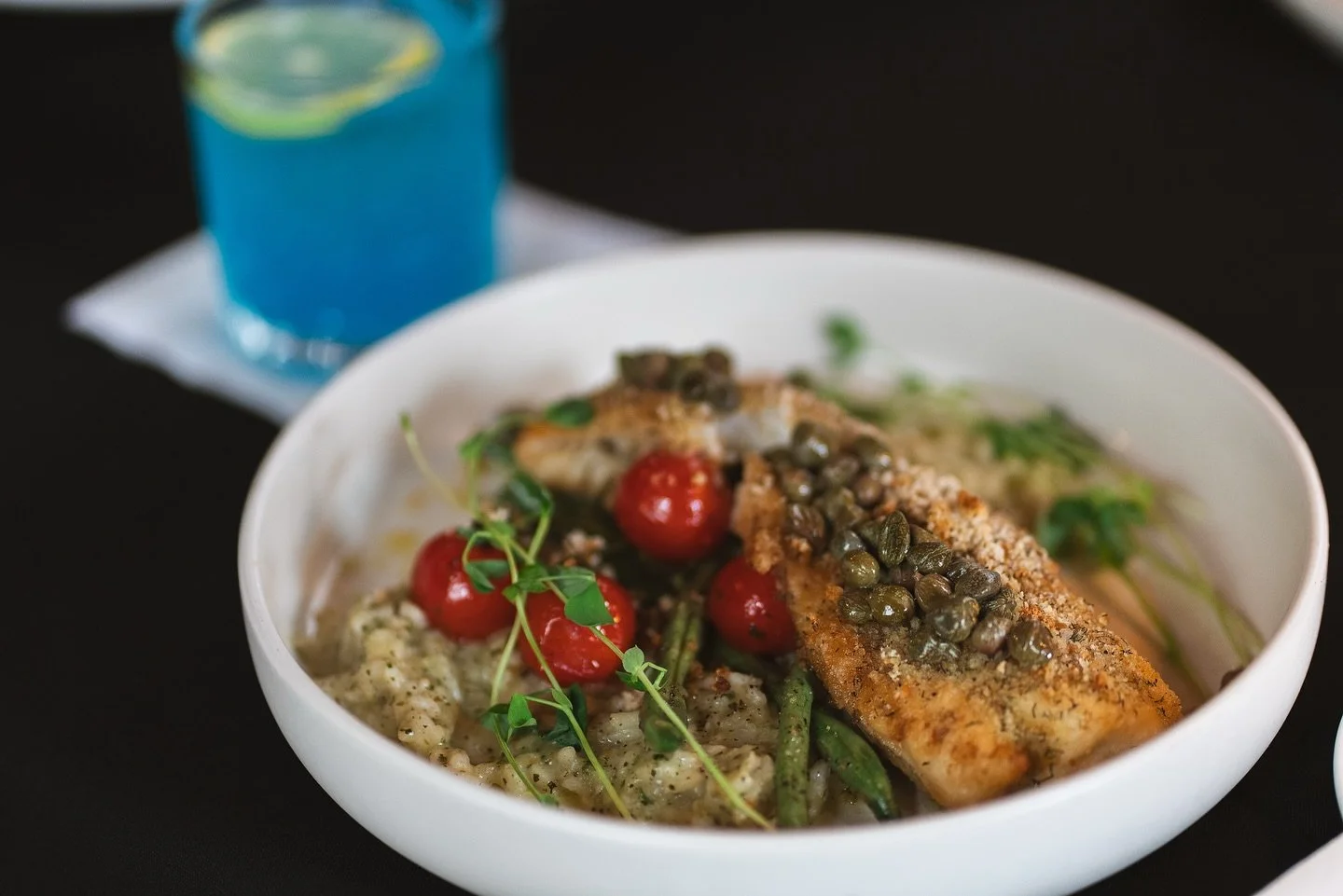 From the ocean to your table. 🐟✨
Our Baked Newfoundland Cod is wild-caught, locally sourced, and full of flavour.

Topped with dill butter crumb and poached capers, served over a bed of lemon dill risotto and market vegetables, this one&rsquo;s a lo