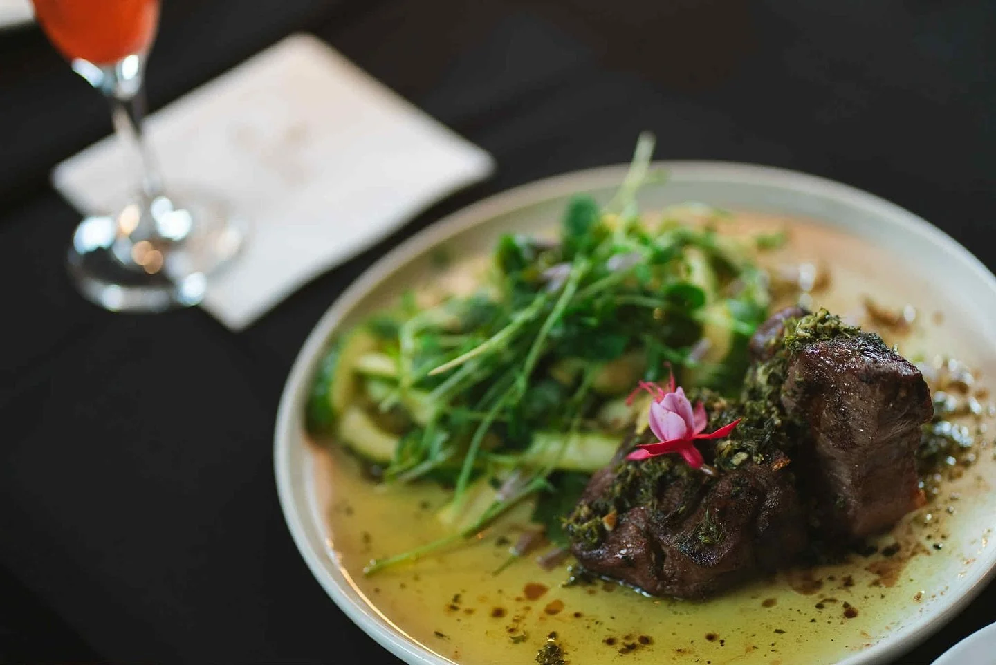 Bold, fresh, unforgettable. 🍋🥩
Our Grilled Lamb Loin is topped with house-made mint chimichurri and paired with shaved asparagus, cucumber, arugula, and a lemon-olive oil vinaigrette.

A dish that delivers balance, beauty, and bold flavour in every