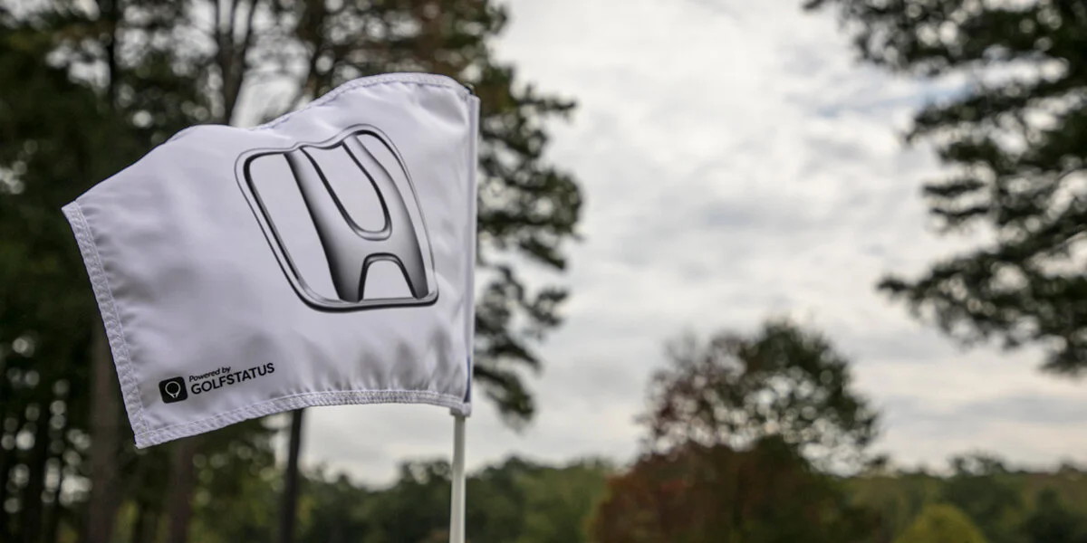An image of a white custom golf pin flag.