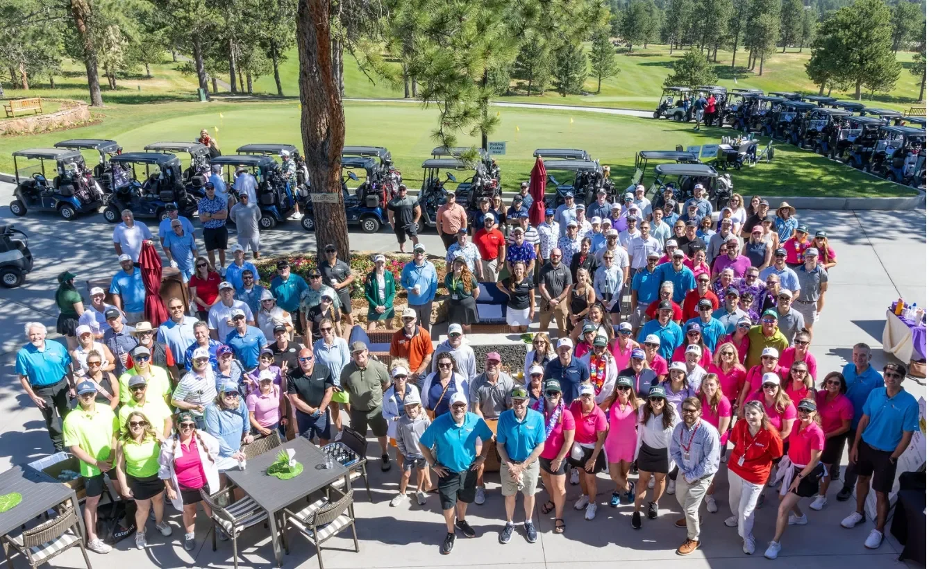 A charity golf tournament's entire field of golfers.