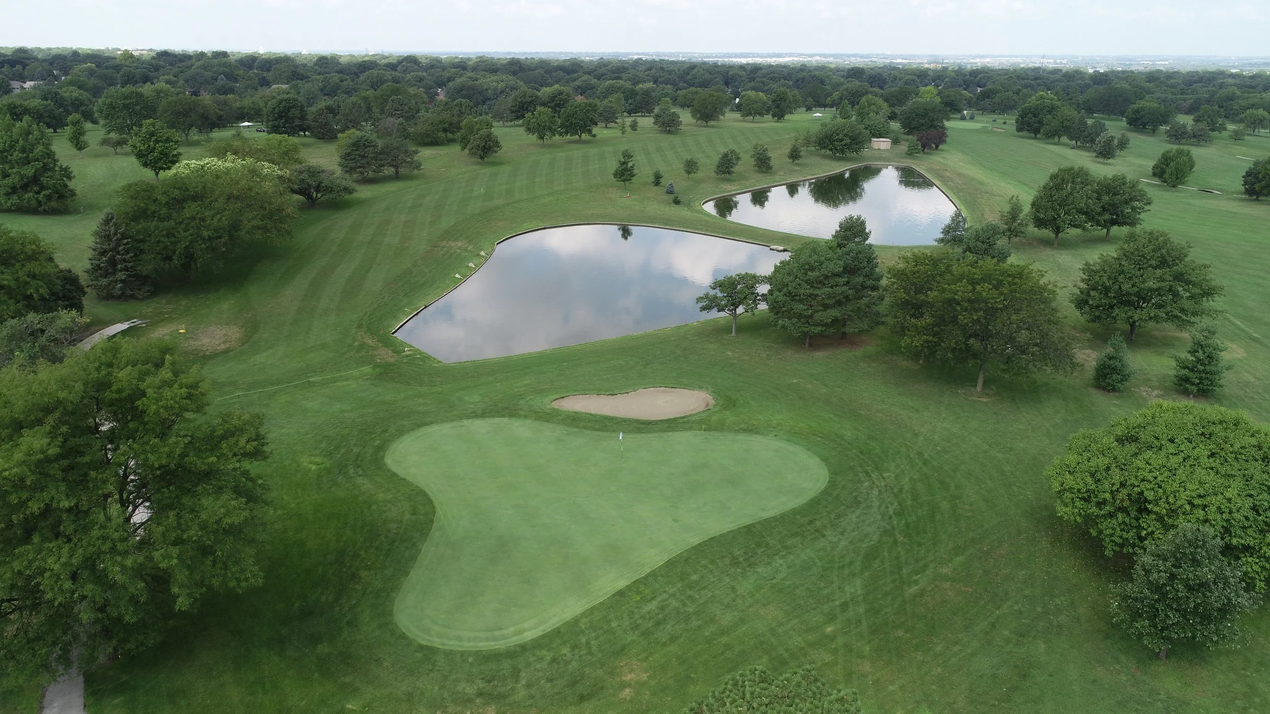 An aerial photo of a practice green where a golf putting contests can be held.