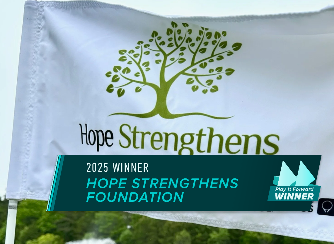A golf pin flag with the Hope Strengthens Foundation logo.