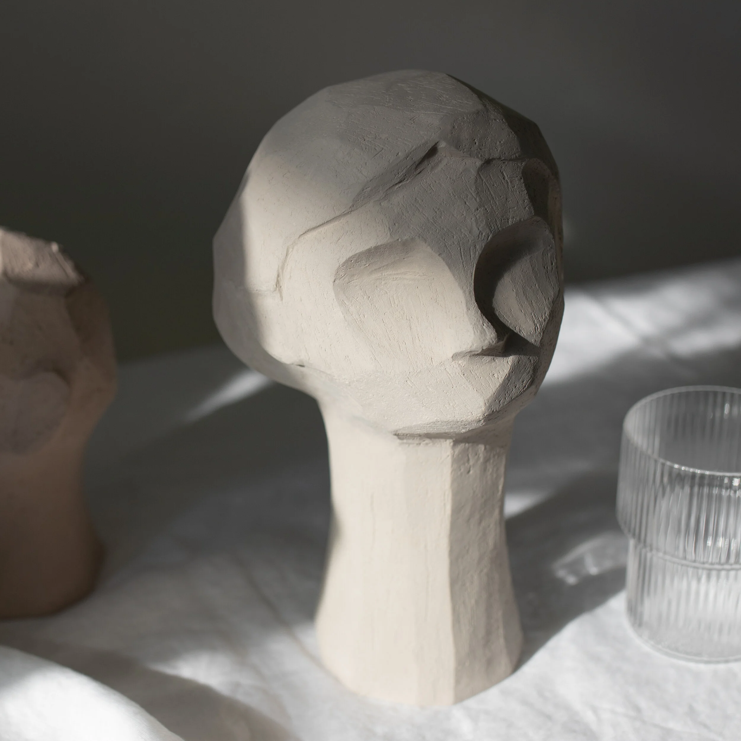 Kristiina sculpture on my table, enjoying the afternoon light.