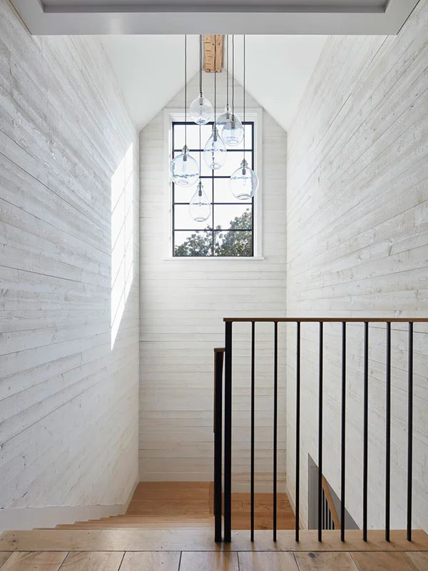 Modern-Farmhouse-Stair-with-Clerestory-Window-and-White-Washed-Shiplap-in-Venice-Beach-Designed-by-Carol-Allen-of-Studio-Allen-Architects-and-Kishani-Perera.jpg