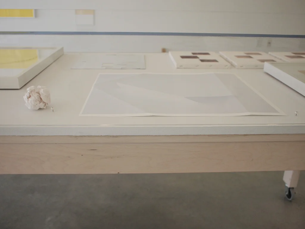 Left: Martin Creed, Crumpled Paper, 1995. Right: Mathew McWilliams, Paper Works (Blue) #9, 2010.