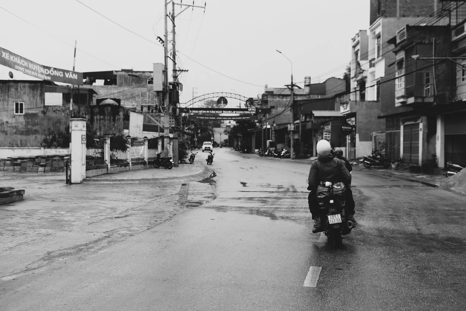 Motorcyclist in Dong Van, Vietnam - Black and White Street Photography