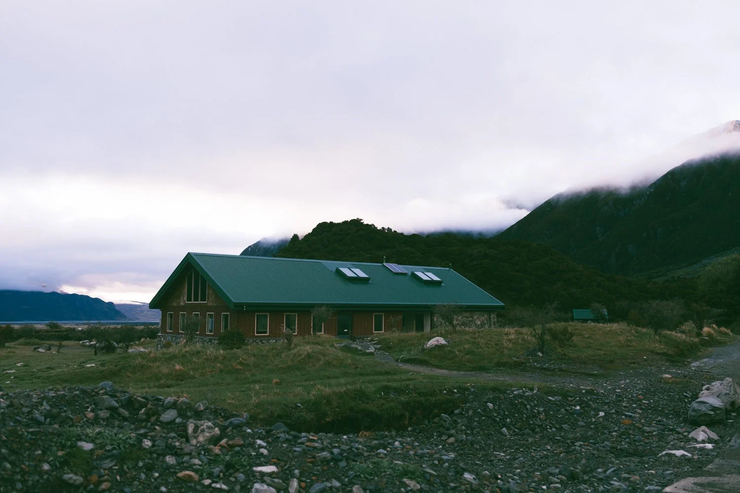 Q8 Modern Classic Lightroom preset for a deep, moody, and earthy cinematic film look. Features olive shadows and warm organic tones.