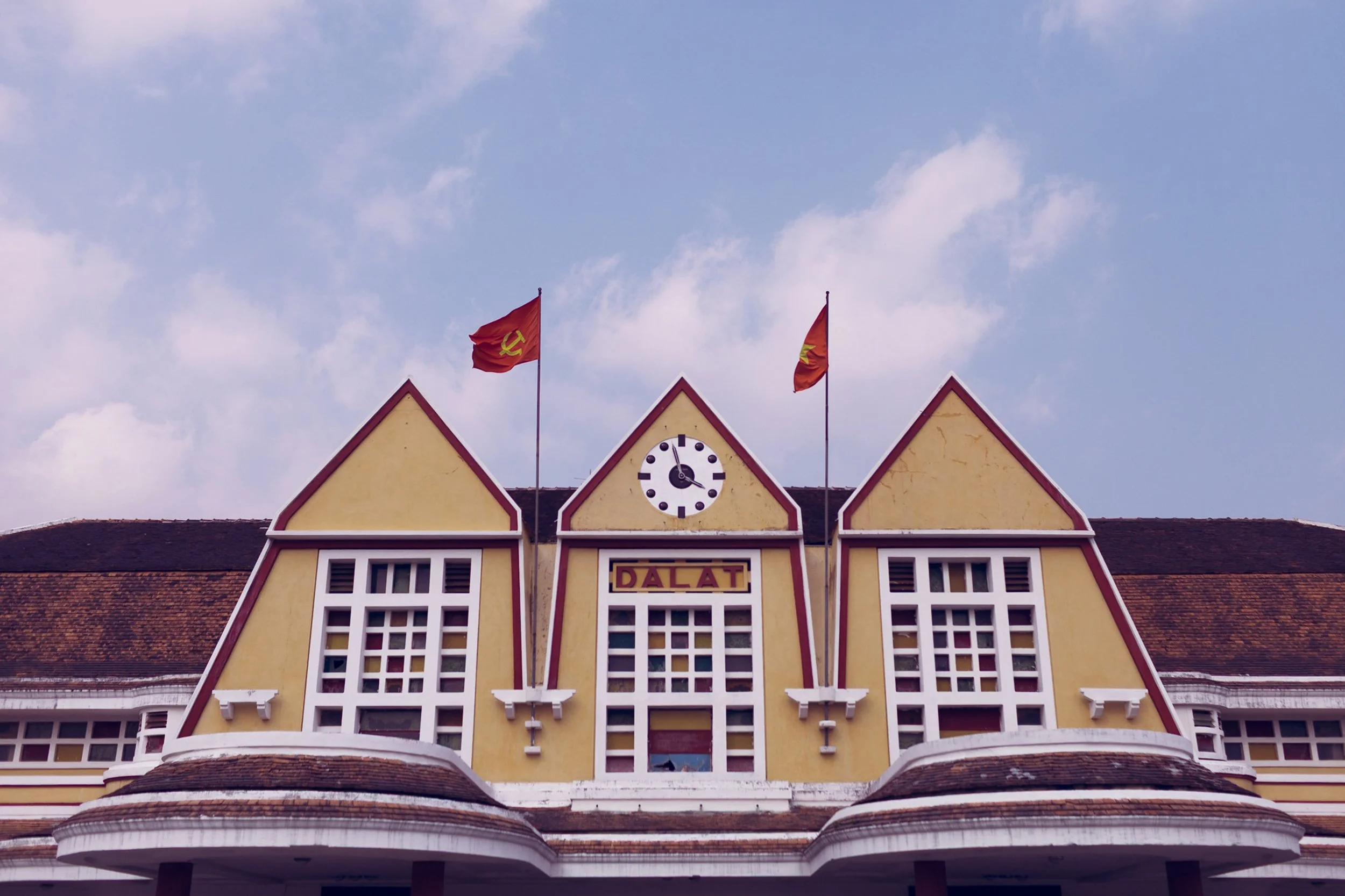 The Da Lat Railway Station in Vietnam, edited with the H3 Tropical Dusk preset for a muted, cinematic, and purple-toned afternoon sky.