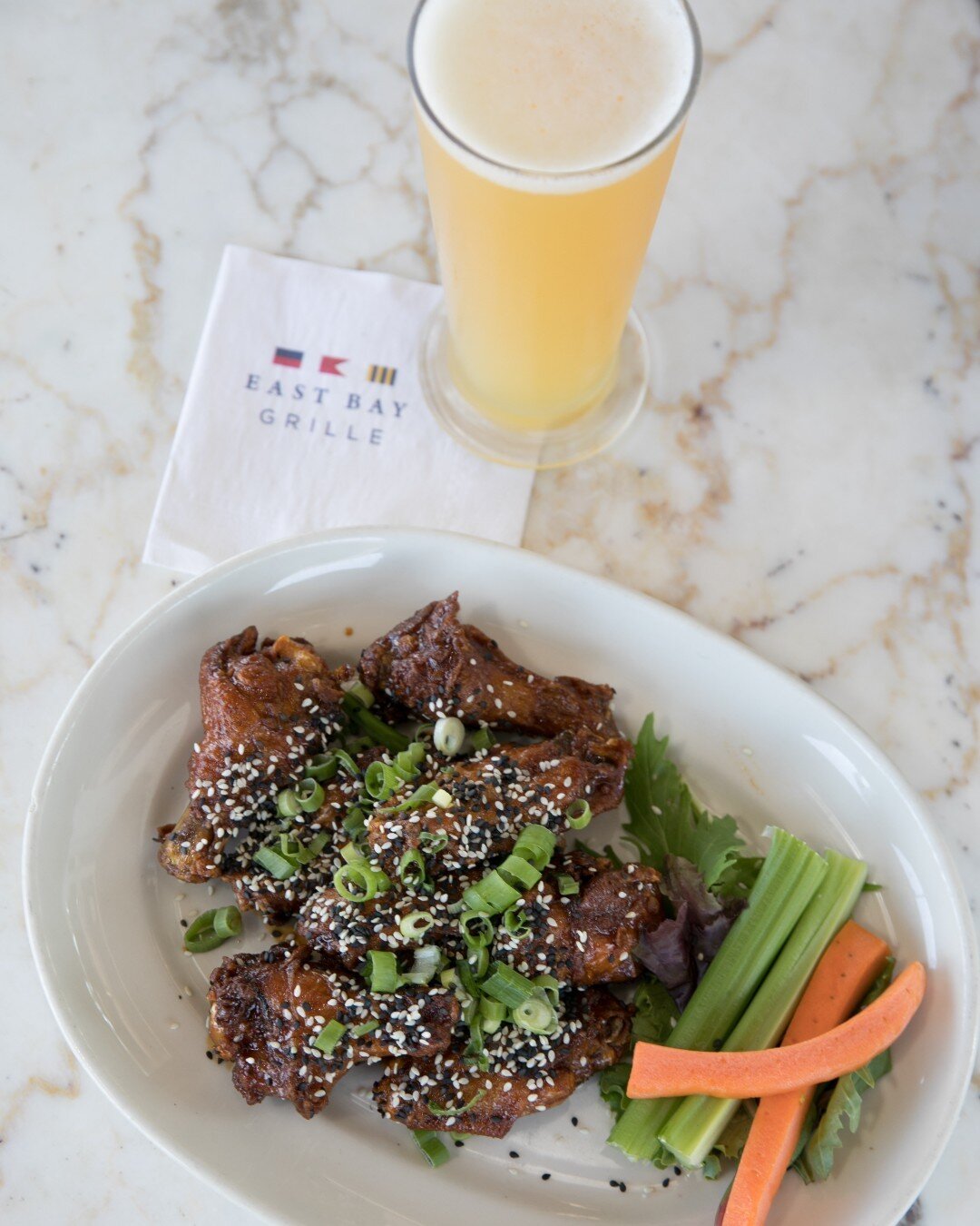 These Japanese BBQ Wings are straight 🔥 - tossed with Japanese BBQ and sriracha sauce, sesame seeds, and scallions.